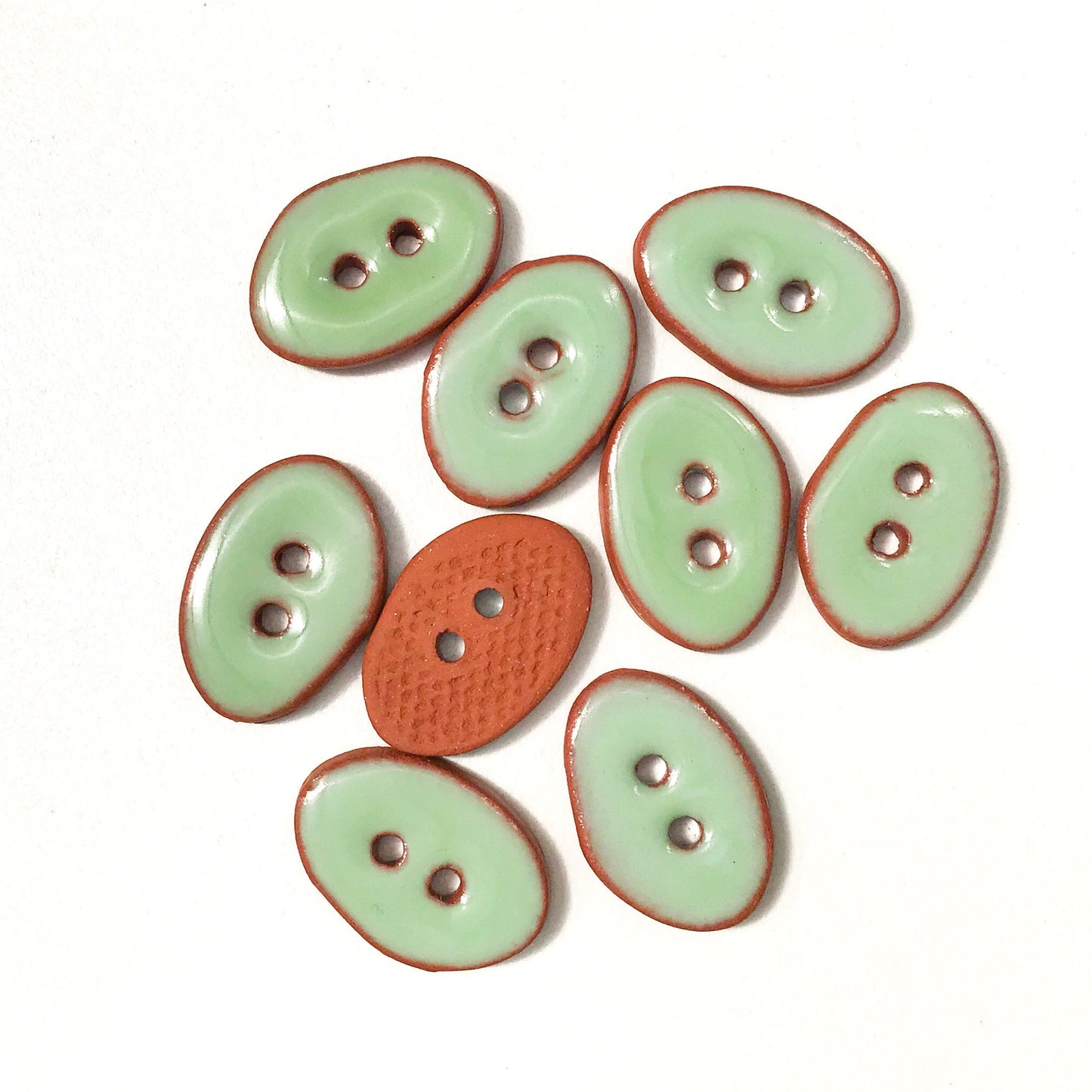 Light Green Oval Clay Buttons on Terracotta - 1/2" x 3/4"