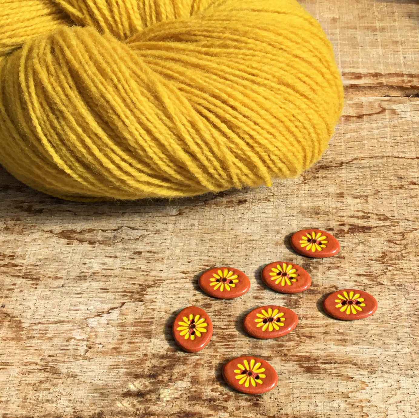 Yellow Daisy Button on Red Clay 5/8" x 7/8"