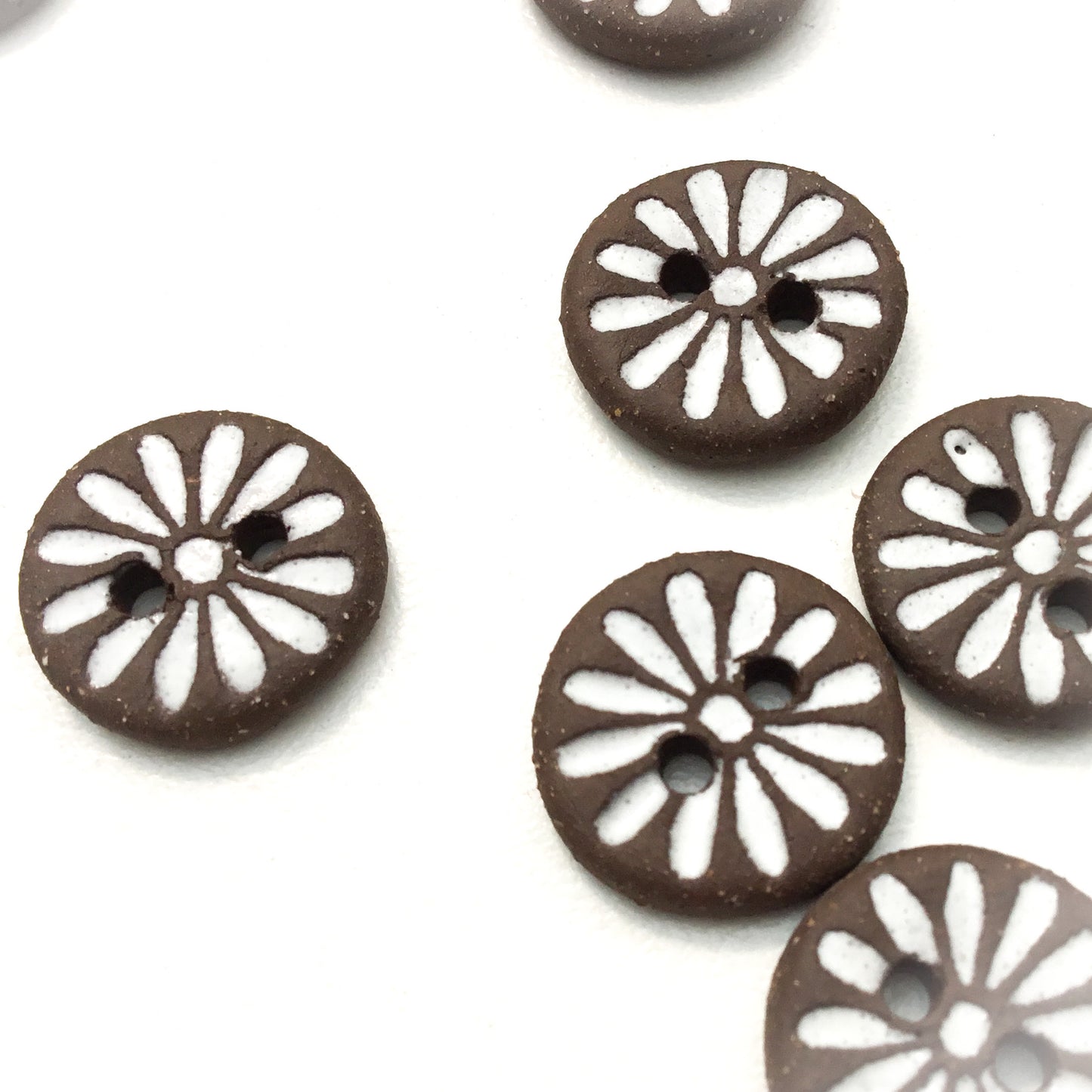 Daisy Buttons on Rustic Black Clay - 9/16"