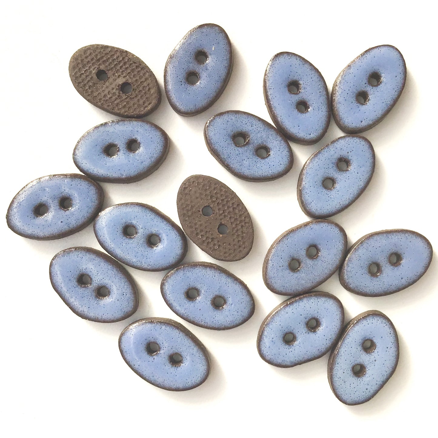 Blue Oval Clay Buttons on Black Clay - 1/2" x 3/4"