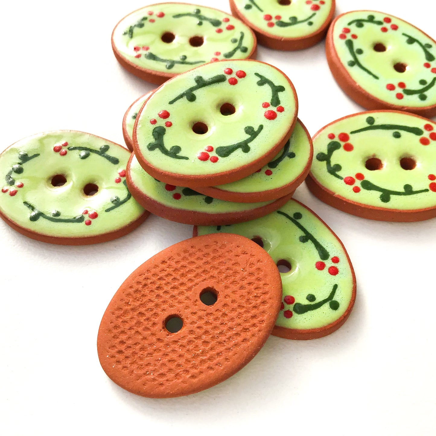 Green Ceramic Buttons with Small Red Flowers  3/4" x 1-1/16"