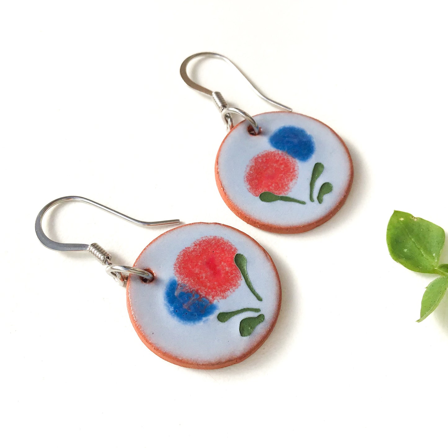 Blooming Red & Blue Flower Earrings on Red Clay