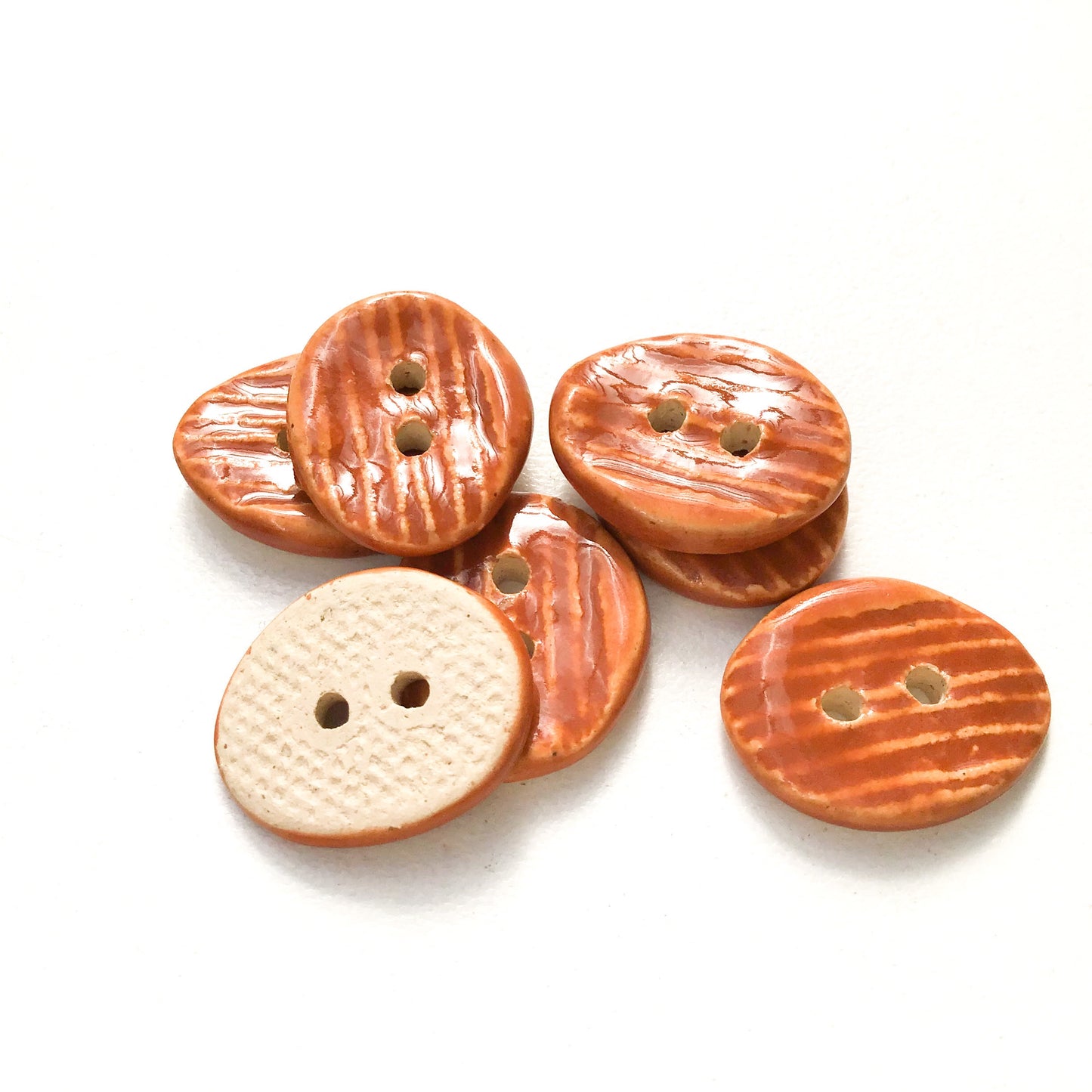 Orangish-Brown Textured Ceramic Buttons  9/16" x 11/16" - 7 Pack