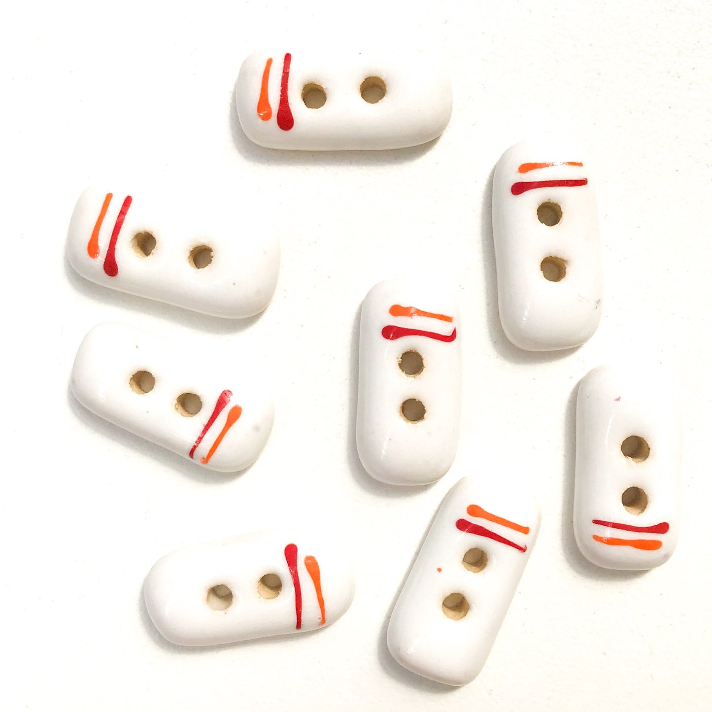 Rectangular White Ceramic Buttons with Orange + Red Lines - White Clay Buttons - 3/8" x 3/4" - 8 Pack